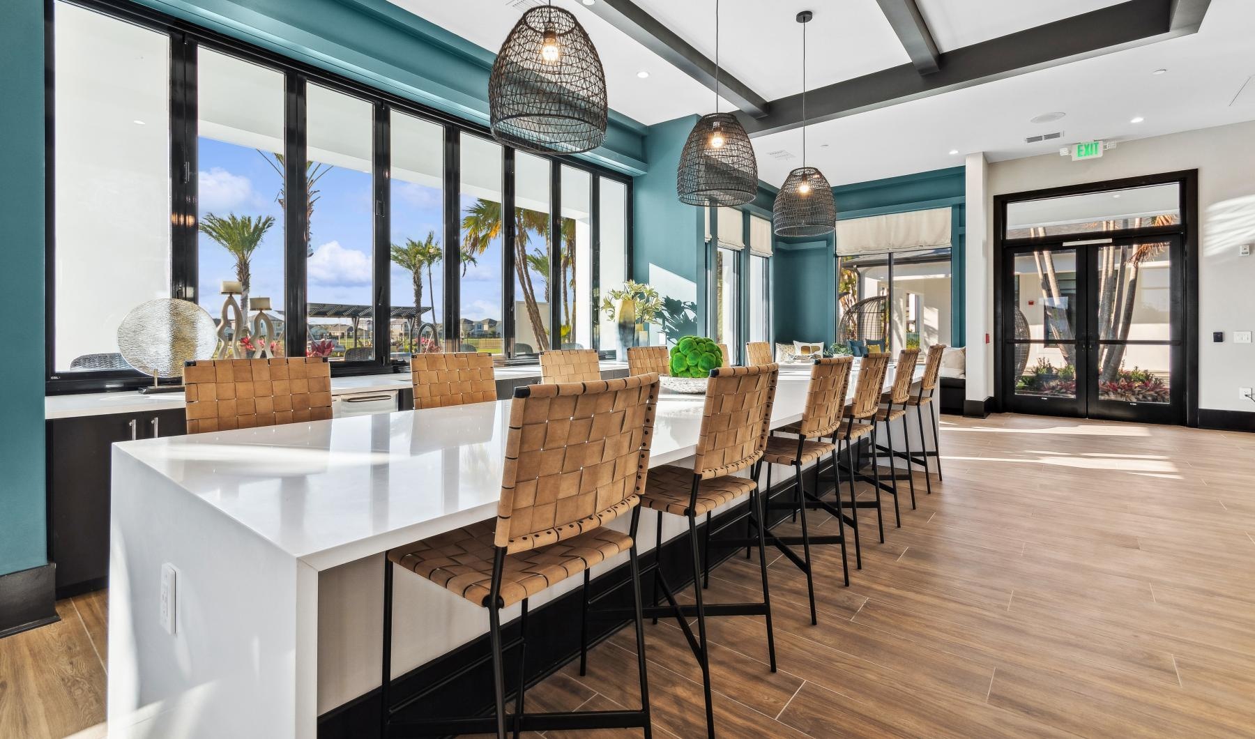 Take advantage of all Ascend Nona West has to offer a large bar with barstools and white counters