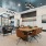 a work room with a table and chairs