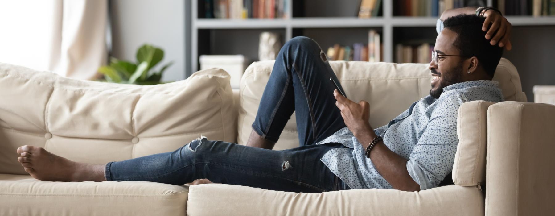 a person lying on a couch