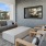 an outdoor lounge with a couch and a table